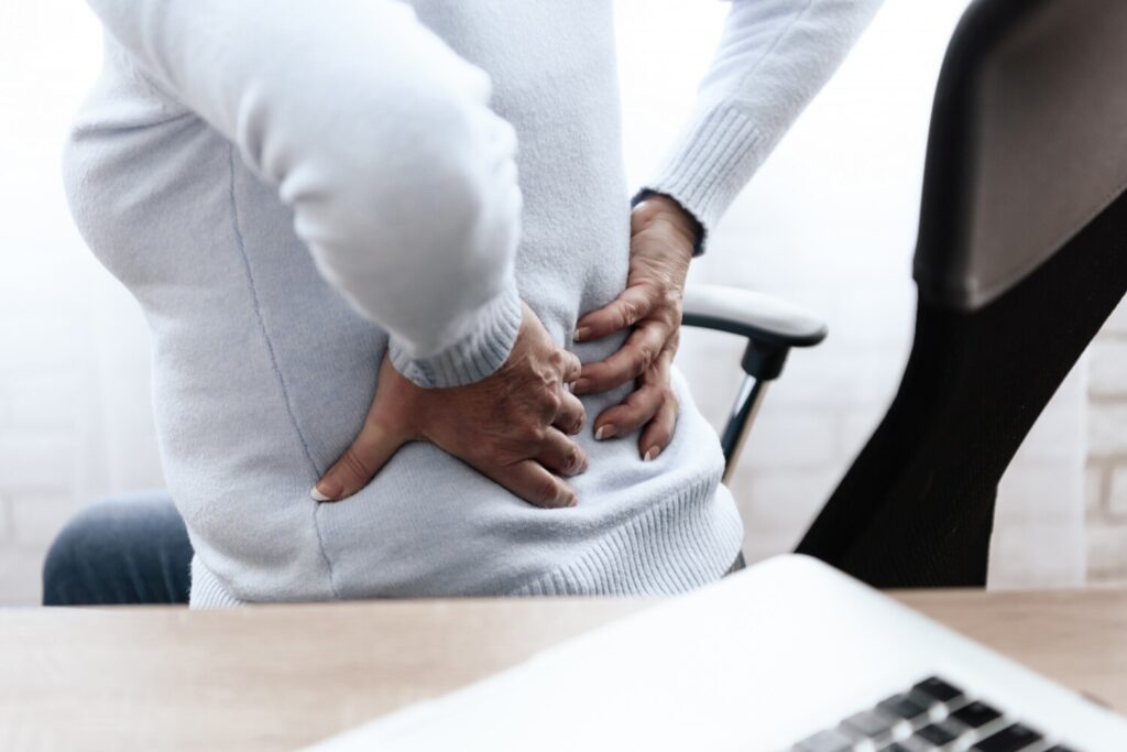 Woman has pain her back she feels bad 99043 4932 Woman has pain her back she feels bad 99043 4932
