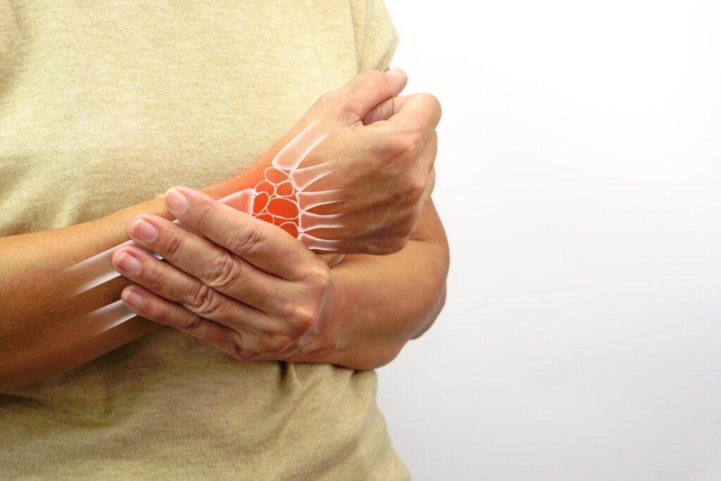 Woman with wrist pain with virtual bones white background healthcare office syndrome concept 339673 892 Woman with wrist pain with virtual bones white background healthcare office syndrome concept 339673 892